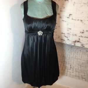 Small Black silky dress stretchy no zips with jewel knee length